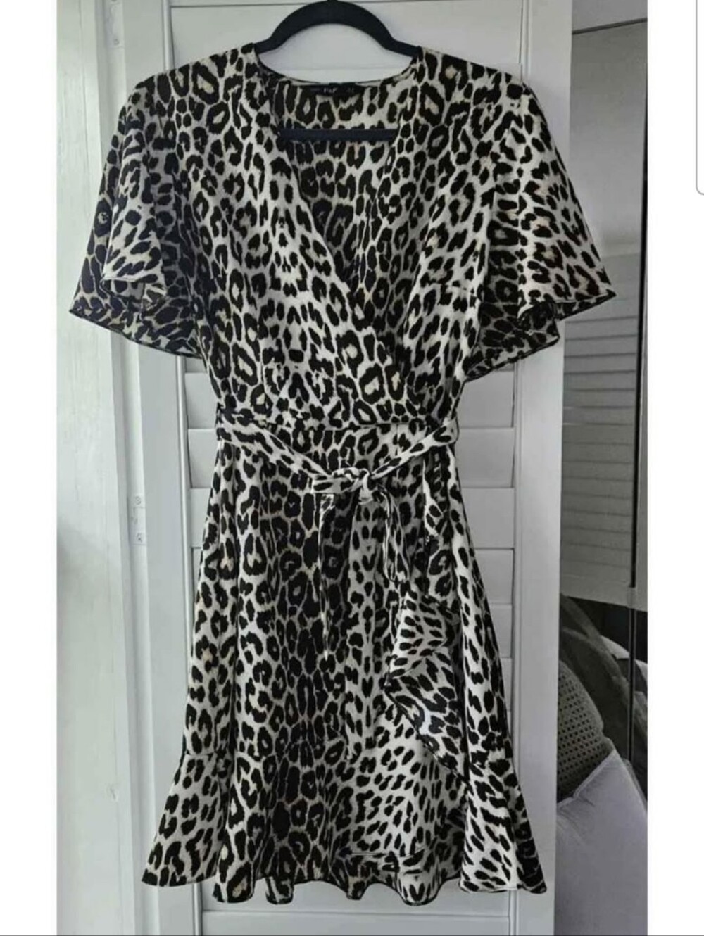Leopard Print Wrap Dress With Flutter Sleeves And Ruffled Hem